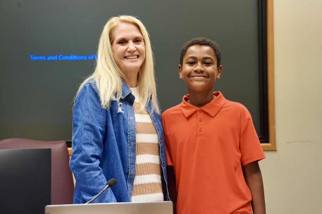 Tristan Scott led the Pledge of Allegiance