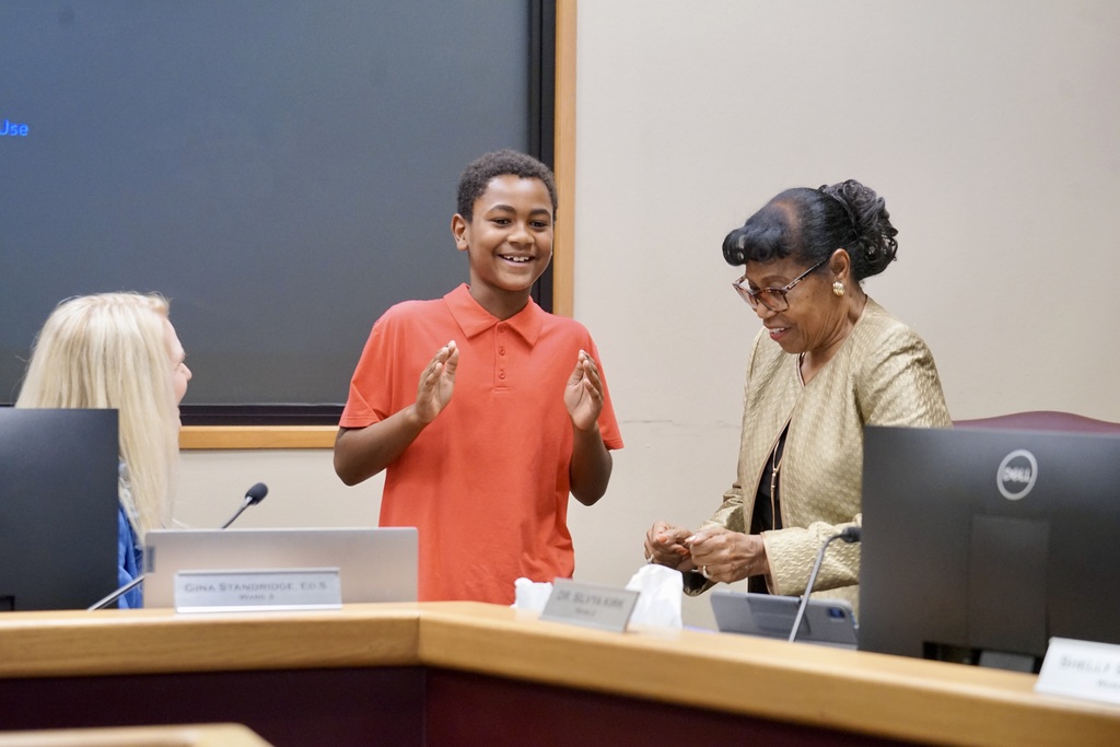 Tristan Scott led the Pledge of Allegiance