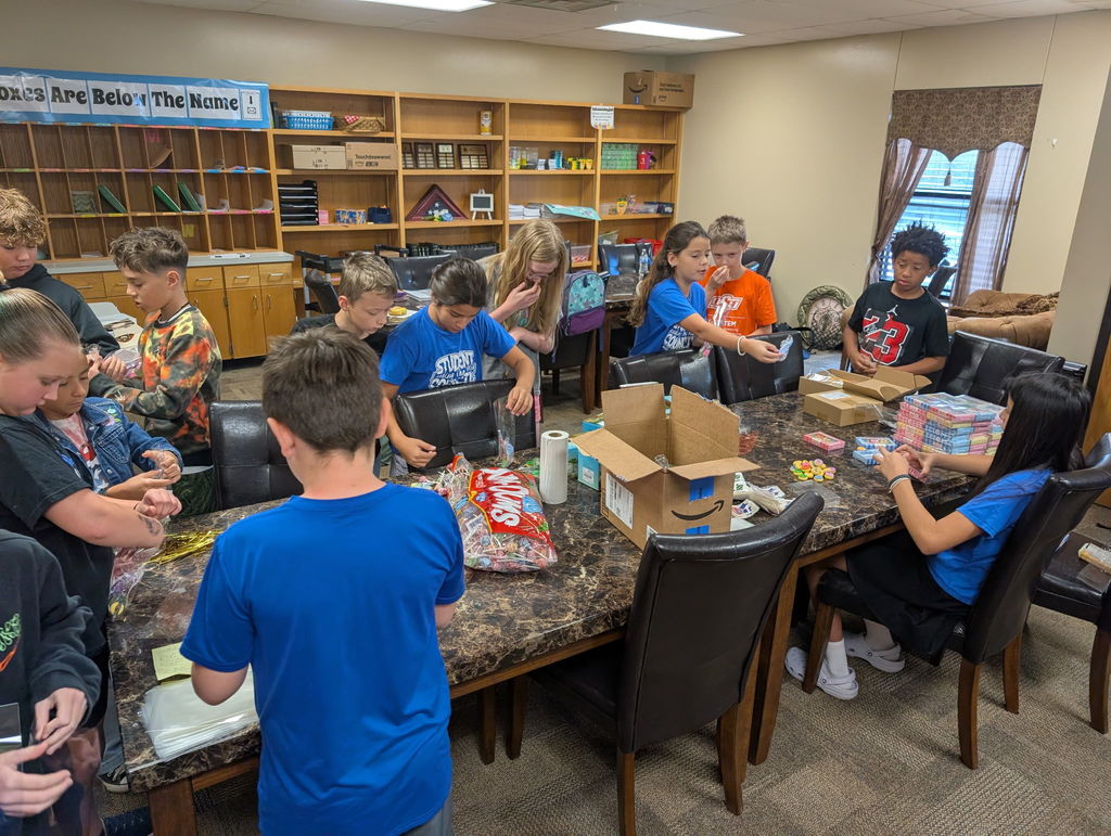 Picture of Student Council members filling birthday bags.