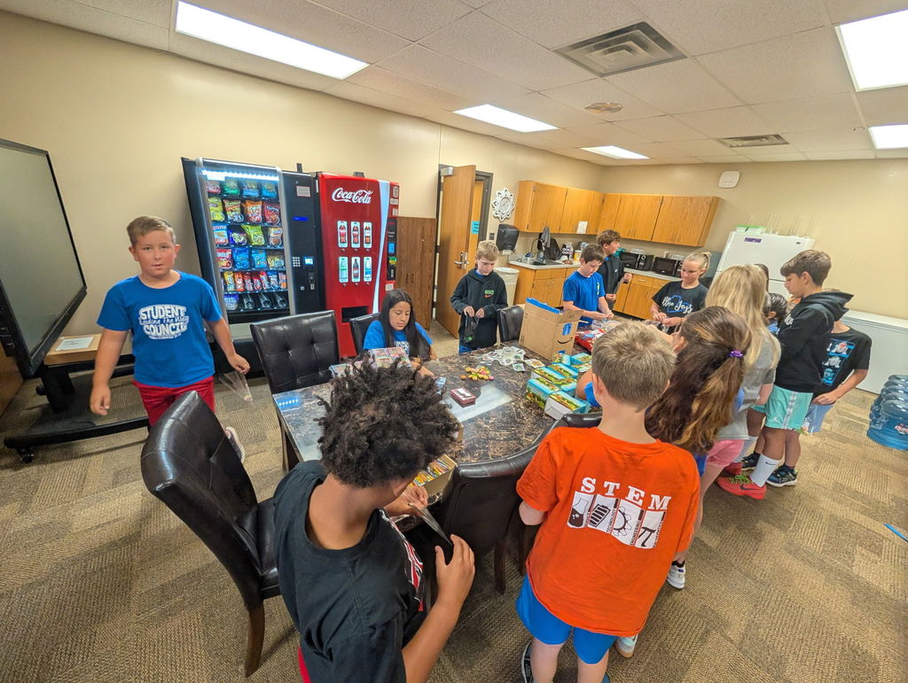 Picture of Student Council members filling birthday bags.