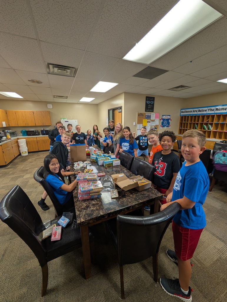 Picture of Student Council members filling birthday bags.