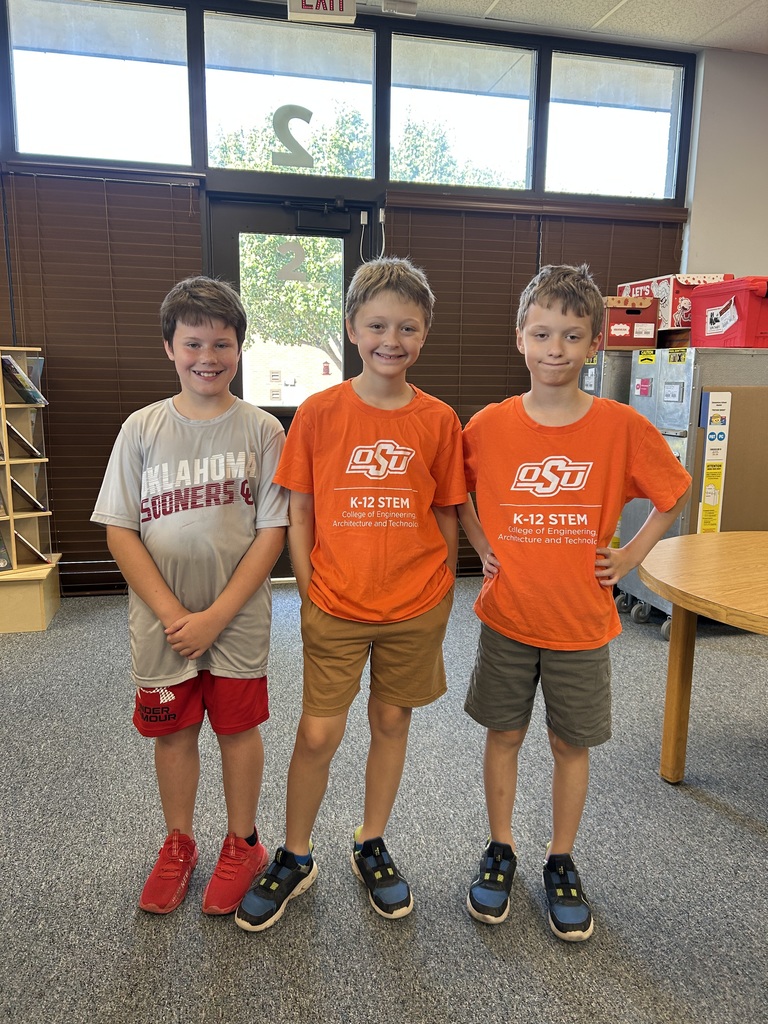 Image of students wearing college and tech shirts.