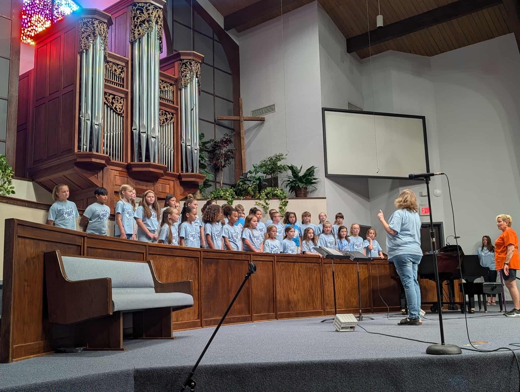 Image of students singing the the Pumpkin Festival.