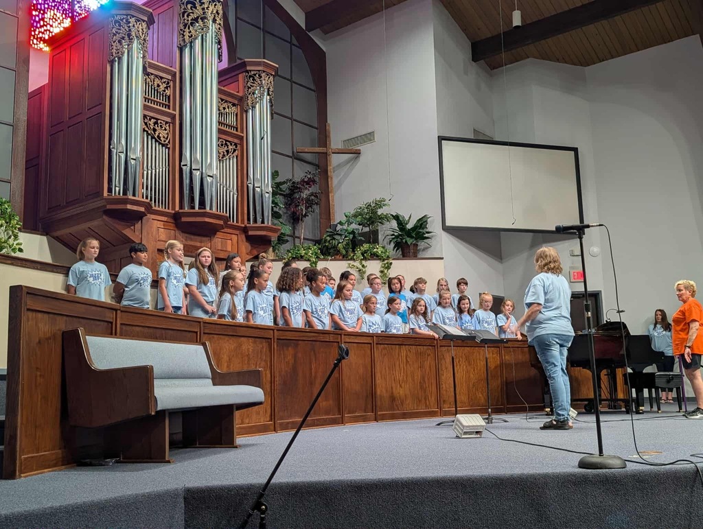 Image of students singing the the Pumpkin Festival.