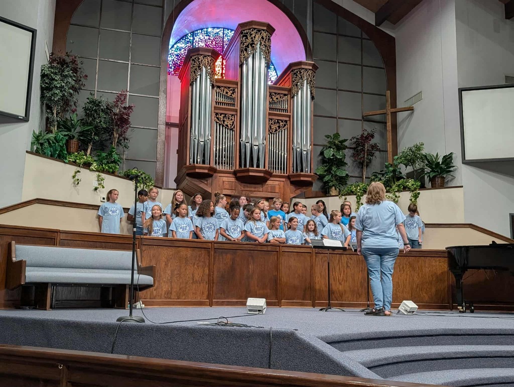 Image of students singing the the Pumpkin Festival.