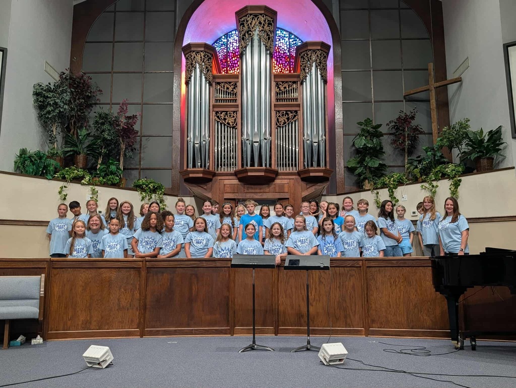 Image of students singing the the Pumpkin Festival.