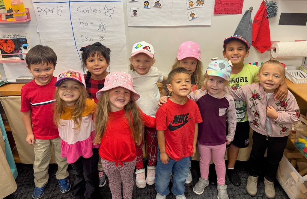 Students wearing red and hats for Red Ribbon Week to "Put a Cap on Drugs".