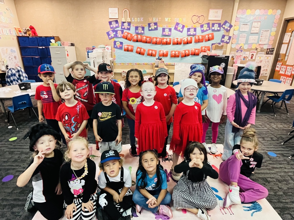 Students wearing red and hats for Red Ribbon Week to "Put a Cap on Drugs".