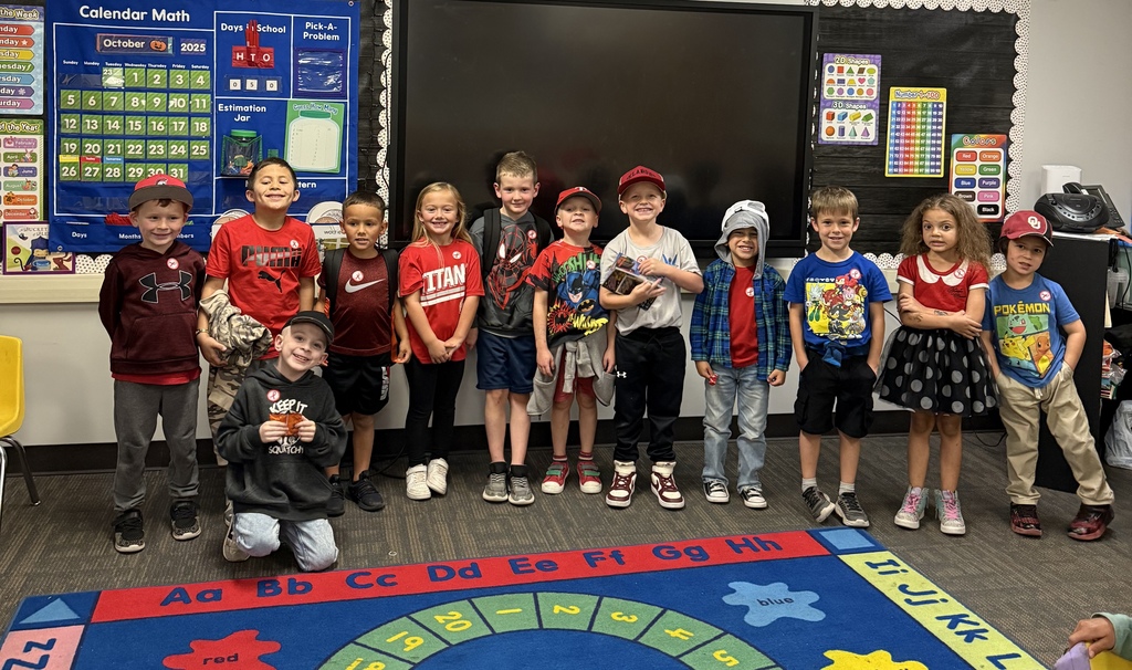 Students wearing red and hats for Red Ribbon Week to "Put a Cap on Drugs".