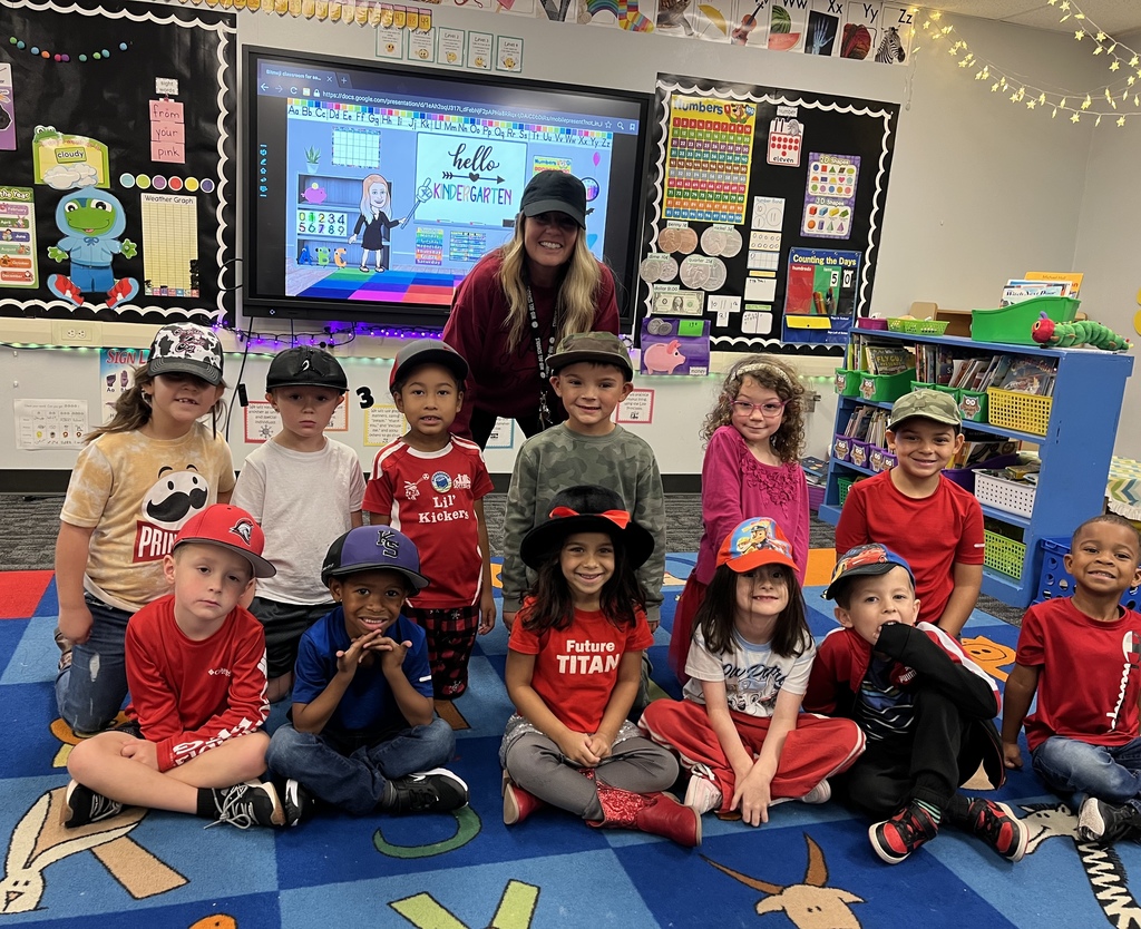 Students wearing red and hats for Red Ribbon Week to "Put a Cap on Drugs".