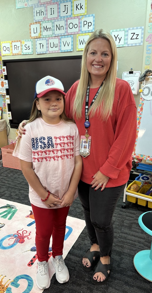 Students wearing red and hats for Red Ribbon Week to "Put a Cap on Drugs".