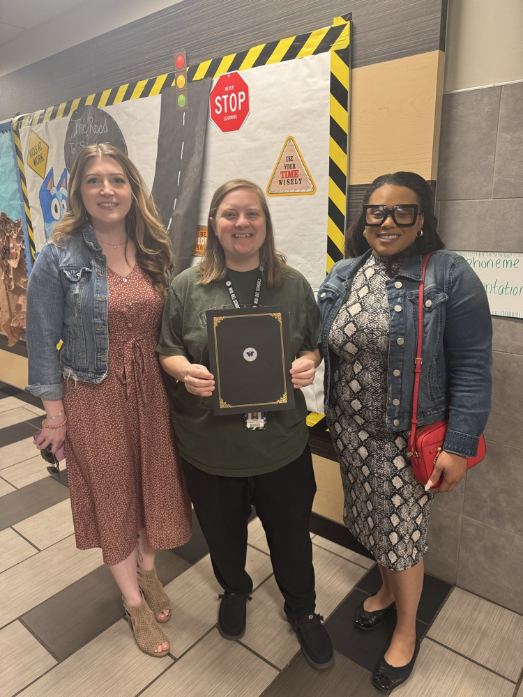 Teacher of the Month and representatives from the Mary Bannister Foundation