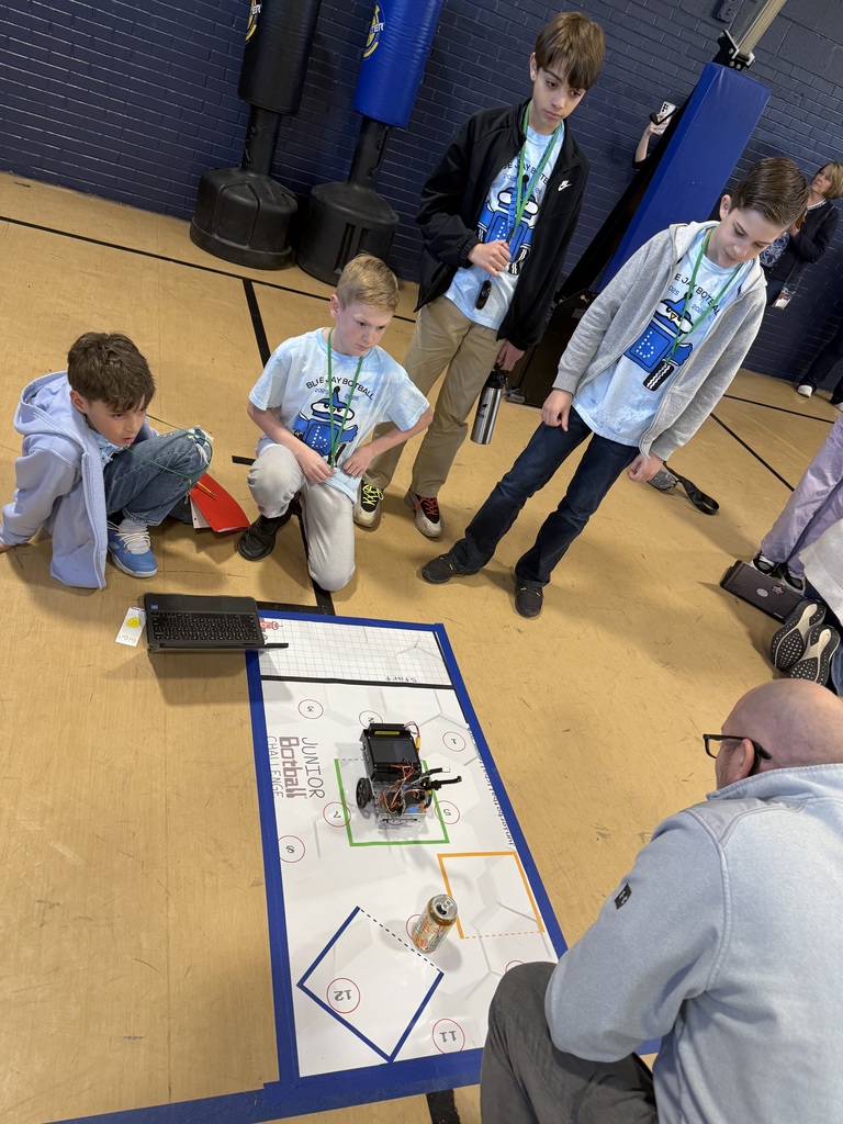Image of students at the Botball competition.  