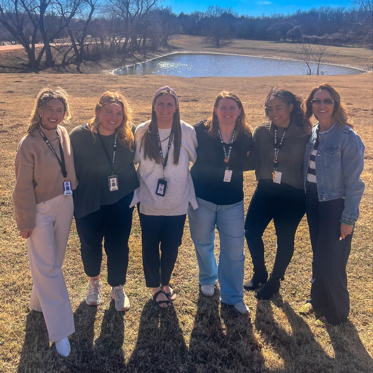 members of our mental health team are standing outside Nero pond at Cedar Ridge.