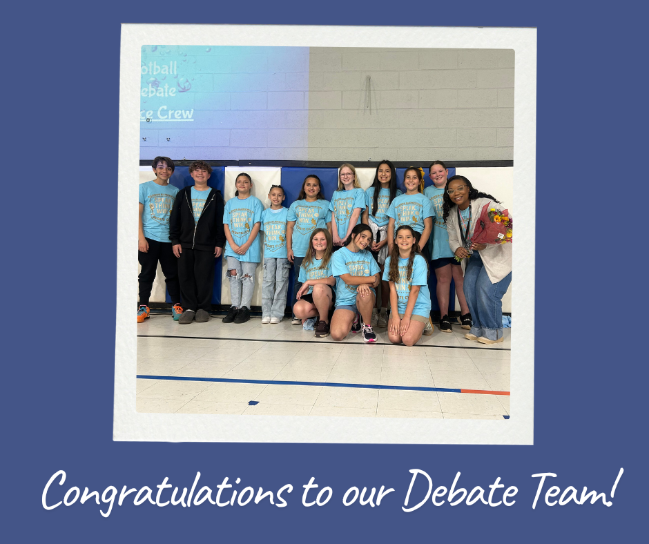 Image of our debate team with Mrs. Cotton.  