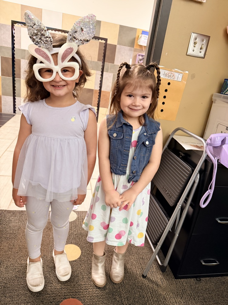 students dressed up for Easter and ready for an egg hunt