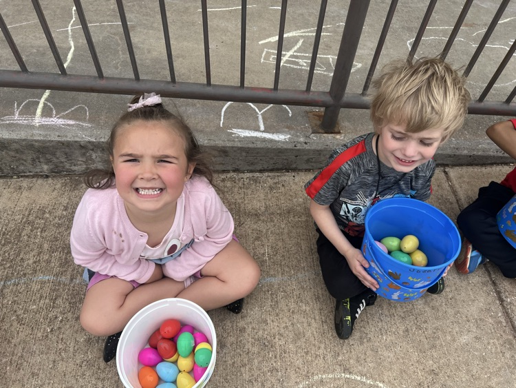 students dressed up for Easter and ready for an egg hunt