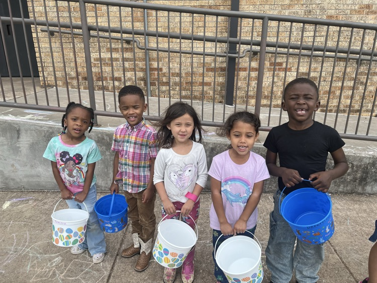 students dressed up for Easter and ready for an egg hunt