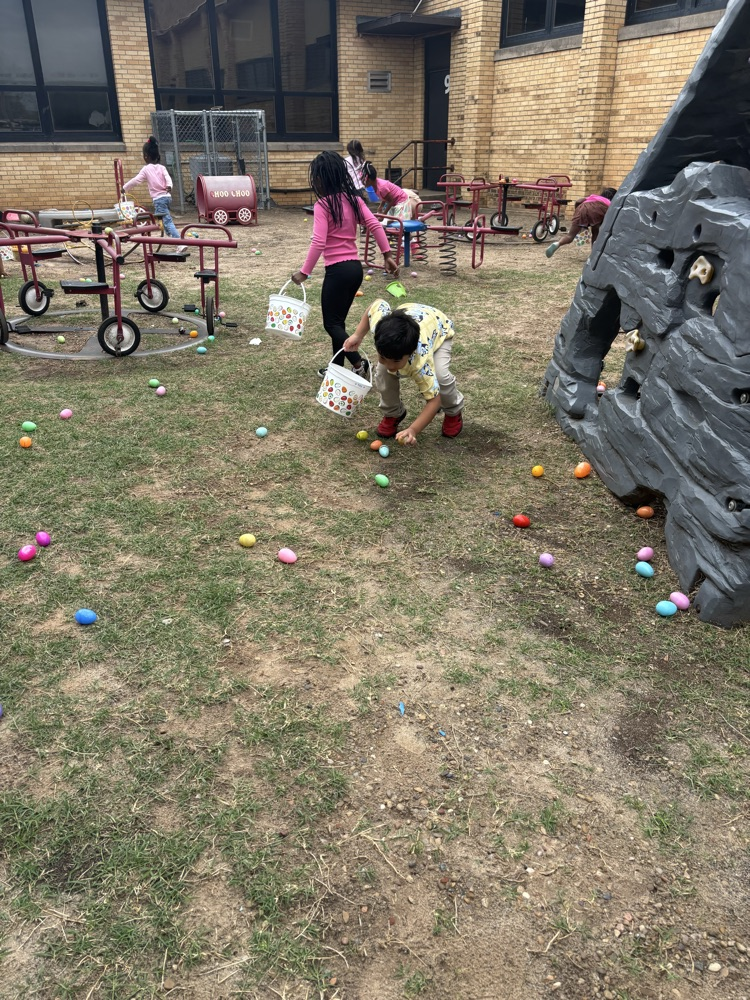 students dressed up for Easter and ready for an egg hunt