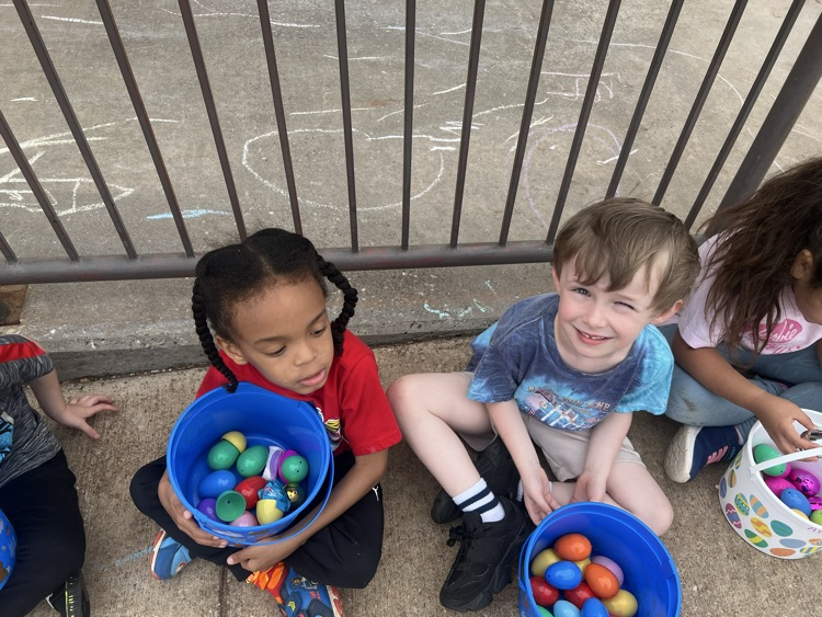 students dressed up for Easter and ready for an egg hunt