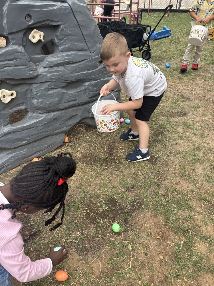 students dressed up for Easter and ready for an egg hunt