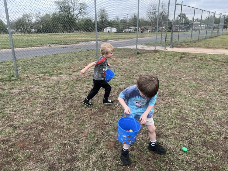 students dressed up for Easter and ready for an egg hunt