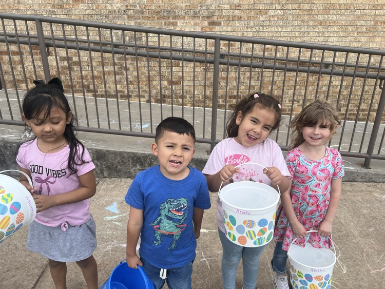 students dressed up for Easter and ready for an egg hunt