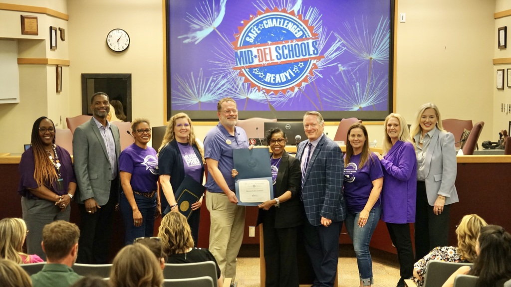 💜 Mid-Del Schools Earns Purple Star Renewal! 💜  We are proud to share that Mid-Del Schools has once again been named a Purple Star School District—an honor renewed for the next three years!  As one of the first districts in Oklahoma to receive this designation, we remain deeply committed to supporting our military-connected students and families across every school in our district.  We also celebrate Tinker Elementary, recognized as an official Purple Star School, continuing to lead the way in creating a welcoming and supportive environment for military families.  A special thank you to our partners at Tinker Air Force Base and Military Liaison Timmy Higgins for presenting our official certificate during the April 13 Board of Education meeting.  💜 In Mid-Del, we proudly stand with those who serve—because we are One District, One Family. 💜  #PurpleStar #MilitaryConnected #OneDistrictOneFamily #MidDelProud