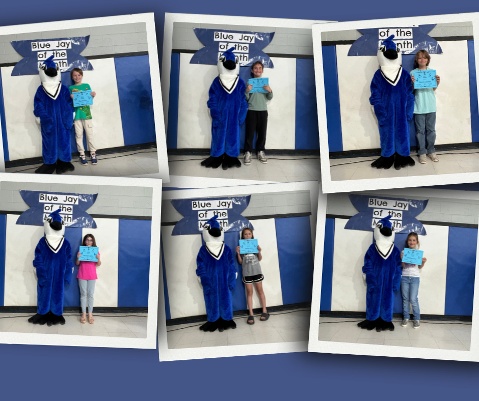 Students at Barnes Elementary receive certificates recognizing them as May Students of the Month.
