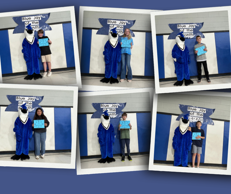 Students at Barnes Elementary receive certificates recognizing them as May Students of the Month.