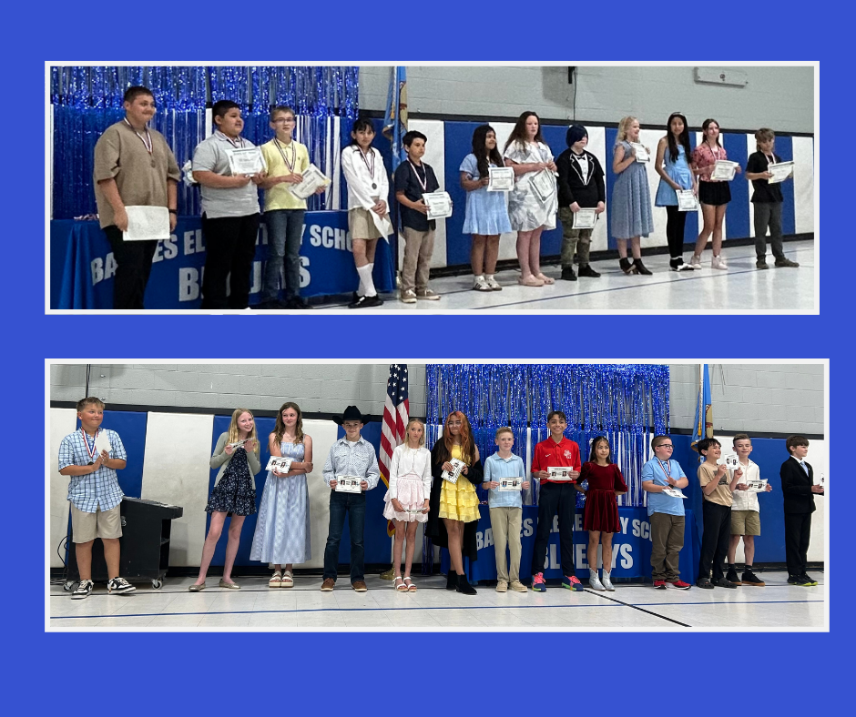 Fifth grade students at Barnes Elementary show their Honor Roll Certificates and Lifetime Bluejay Certificates. 