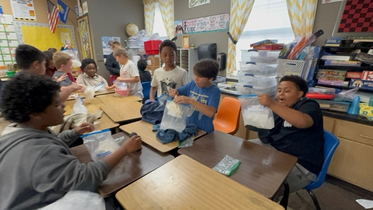 4th Grade students making homemade ice cream