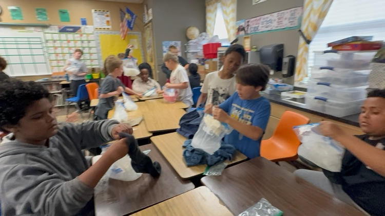 4th Grade students making homemade ice cream