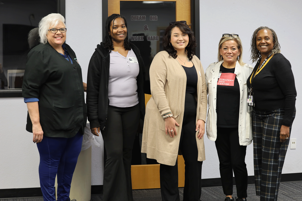 Members of the MDTC Cosmetology Advisory Board members with both instructors