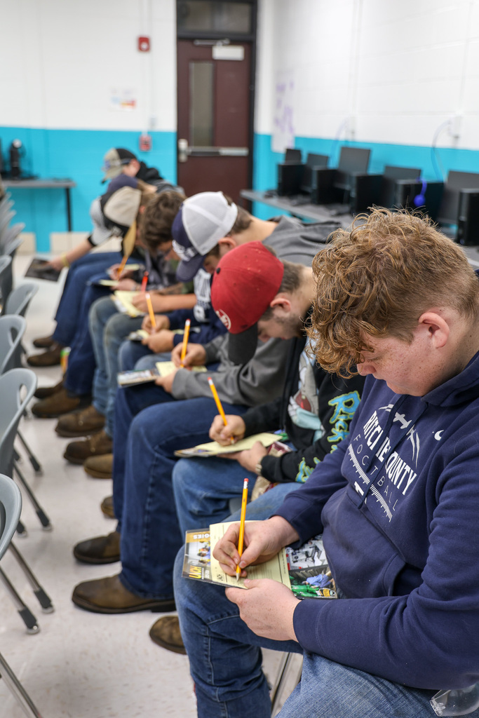 students filling out information card