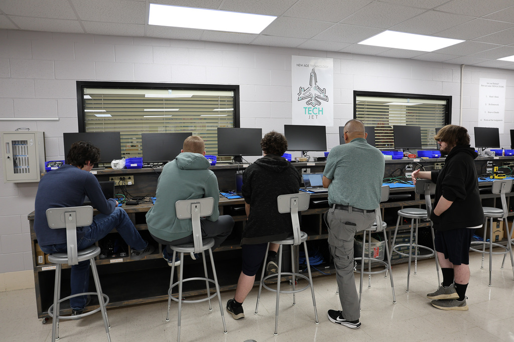 students working on laptops