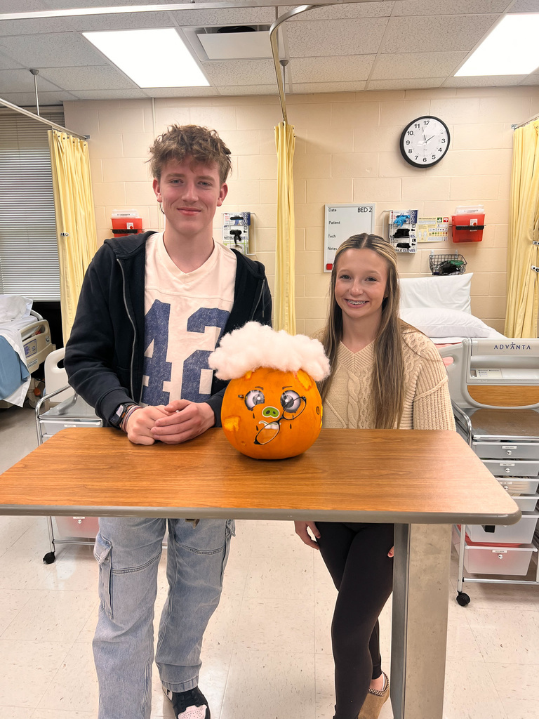 students with their pumpkin patient