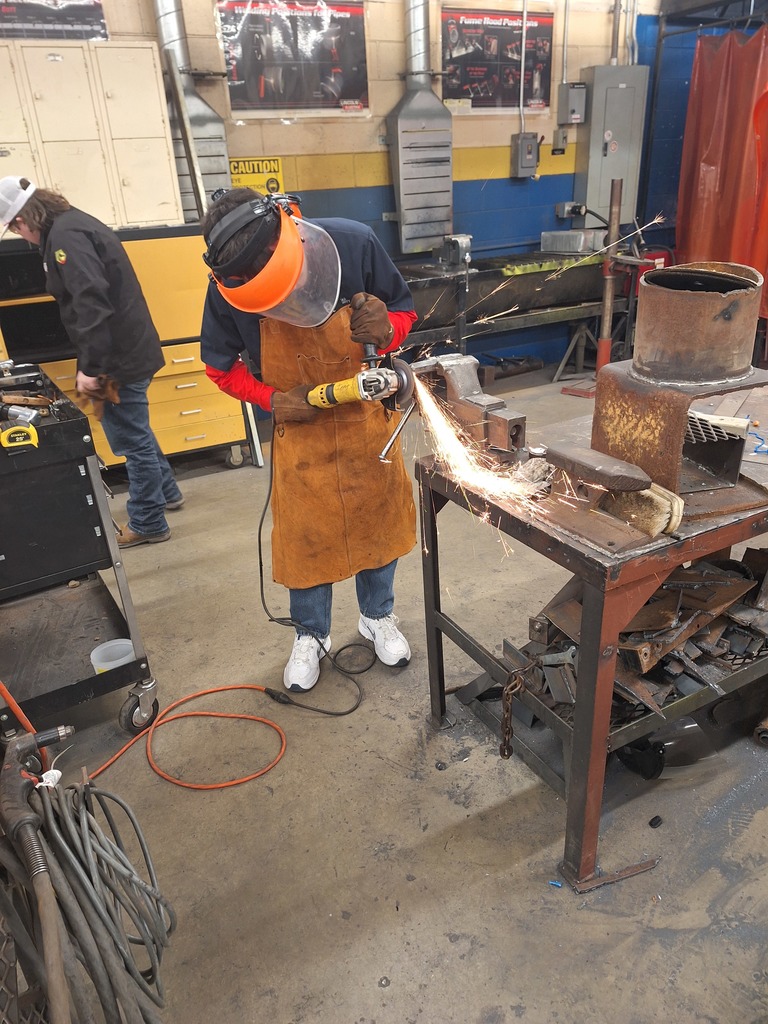 student using grinder