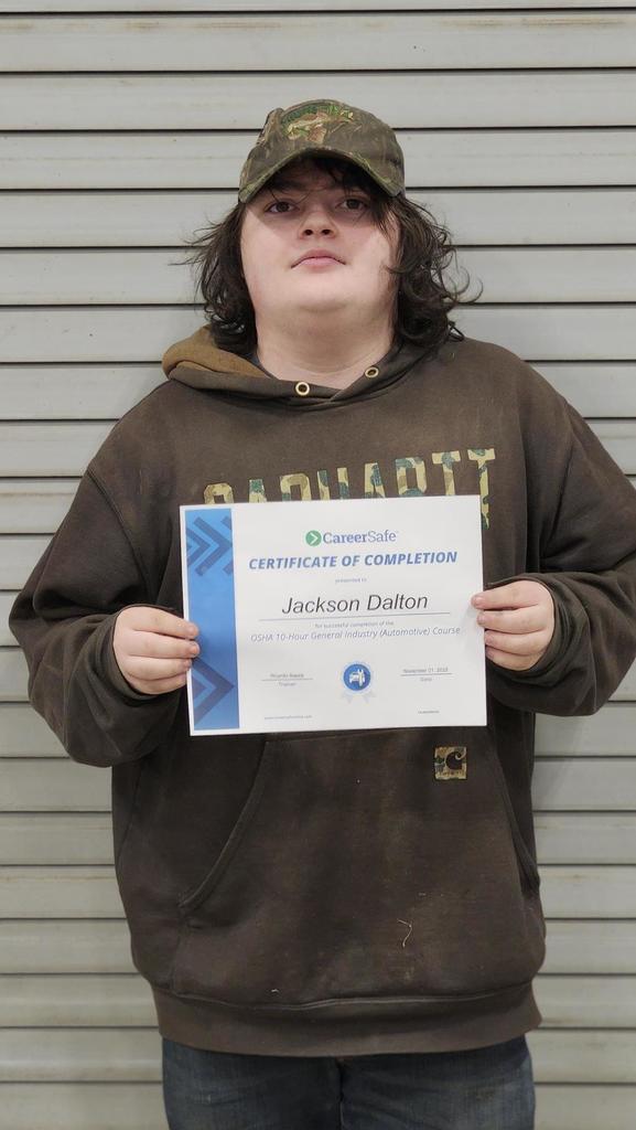 student with certificate