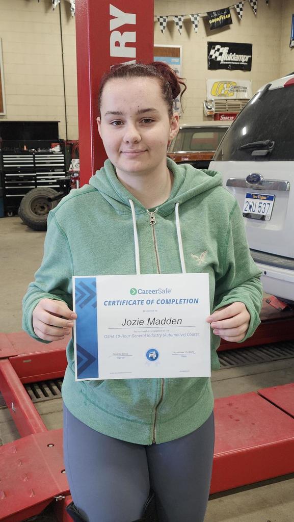 student with certificate