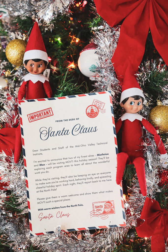 image of elves in Christmas tree with fictional letter from Santa