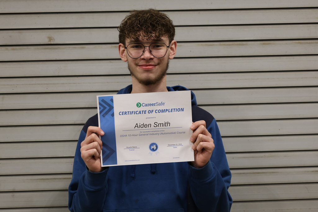 student with certificate