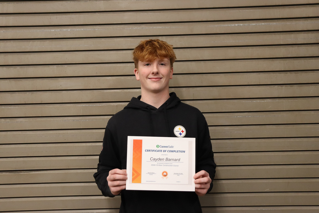 student with certificate