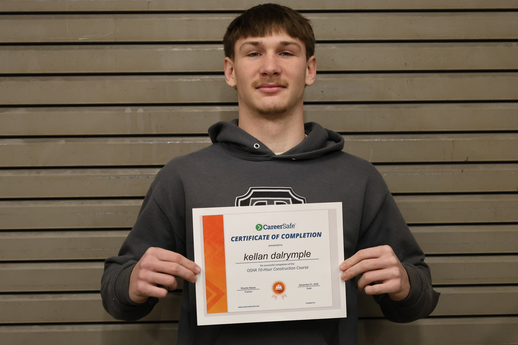 student with certificate