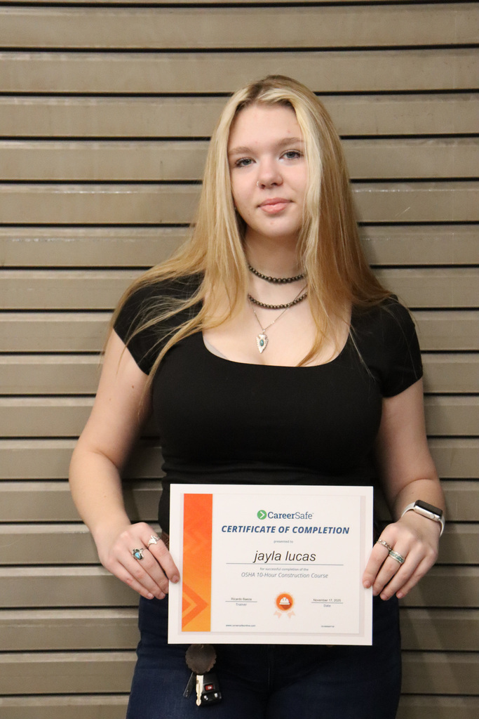 student with certificate