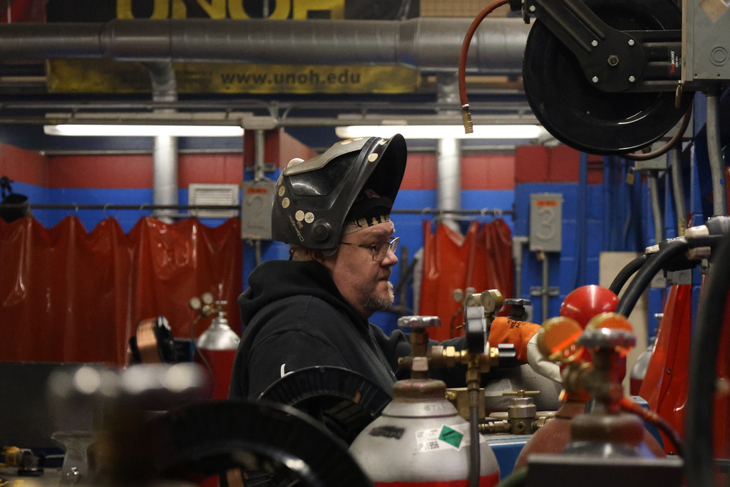 welding instructor in welding shop