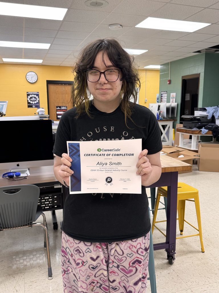 student with certificate