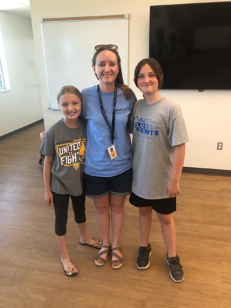 Mrs. Rensema and students at Mathleague competition