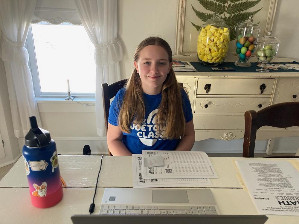 Ava Miller competes in math contest. She advances to state contest