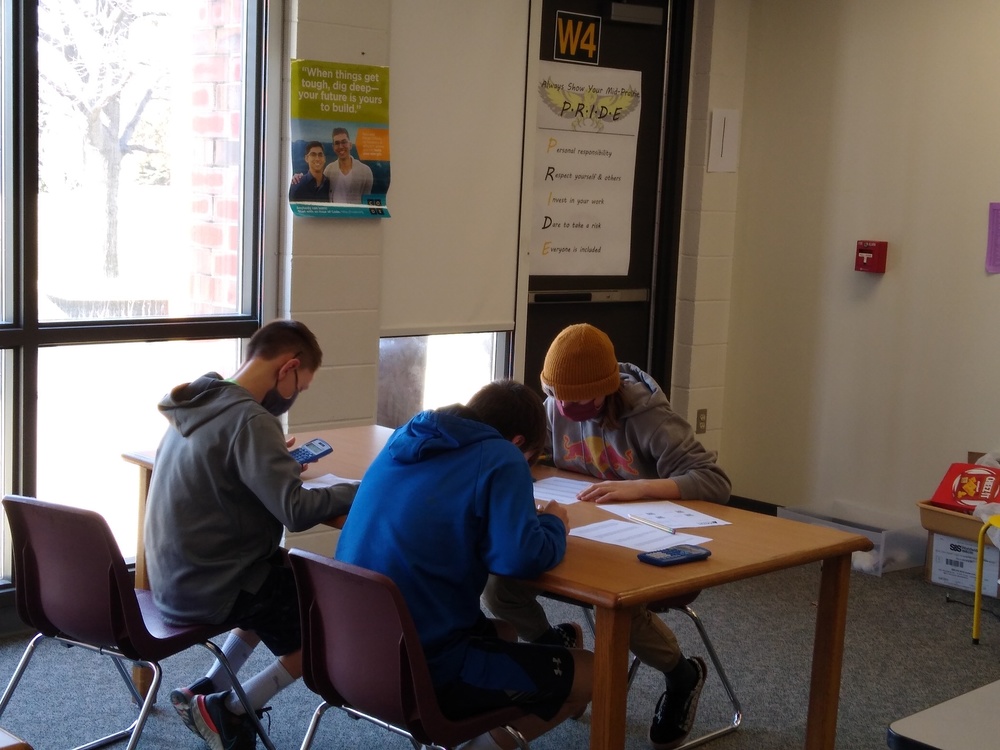 participants work to solve math problems